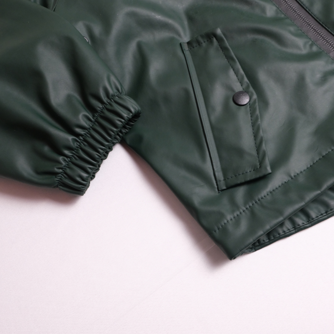 Dark green rain jacket Size: 24-36 M