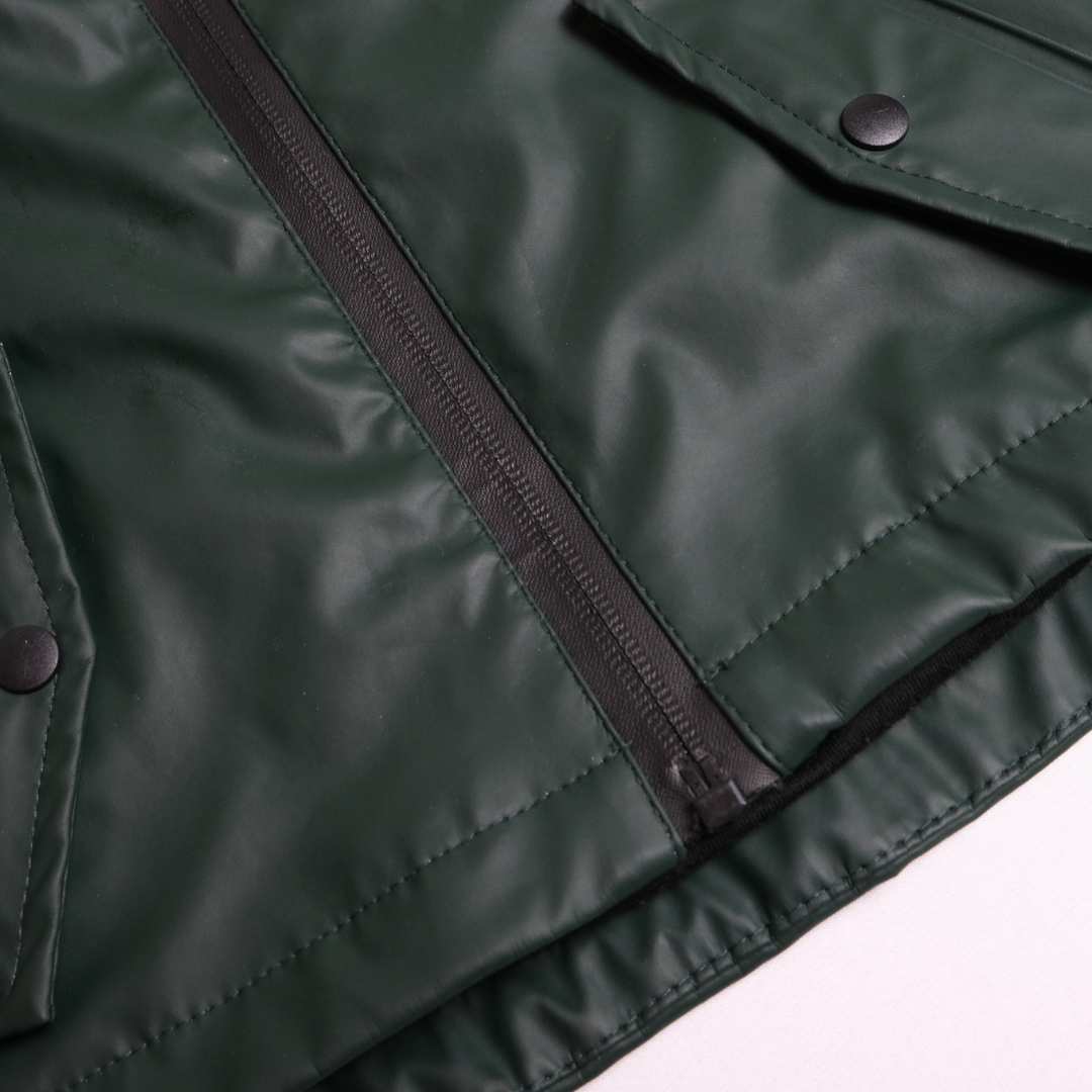 Dark green rain jacket Size: 24-36 M