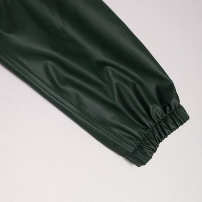 Dark green rain jacket Size: 24-36 M